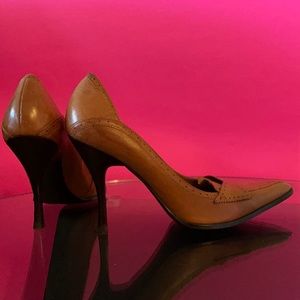 BGBG Girls camel-colored pointed toe pumps.